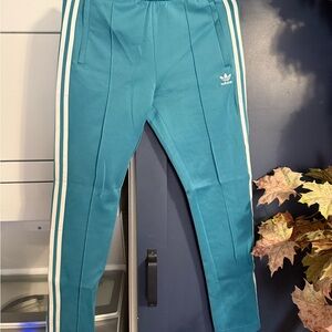 adidas Women's Teal Joggers with White Stripes